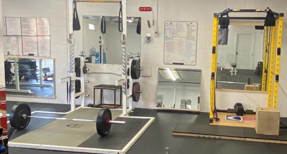 Barbells and racks and weights